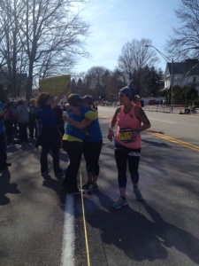 Mom and I hugging at Mile 20!